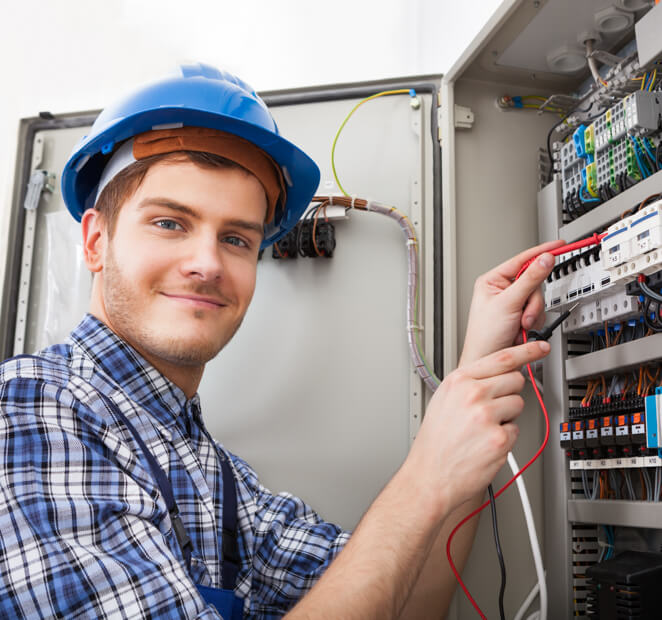 Man performing equipment maintenance